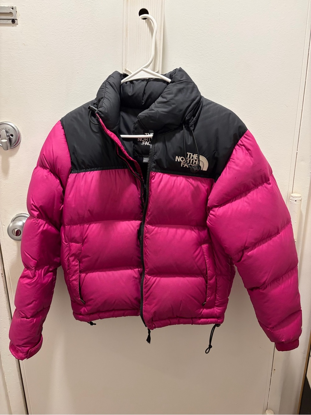 The North Face woman Pink and Black Puffer Jacket